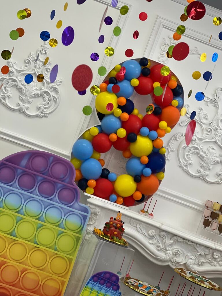 Colourful 8th Birthday Pop It Balloon Backdrop