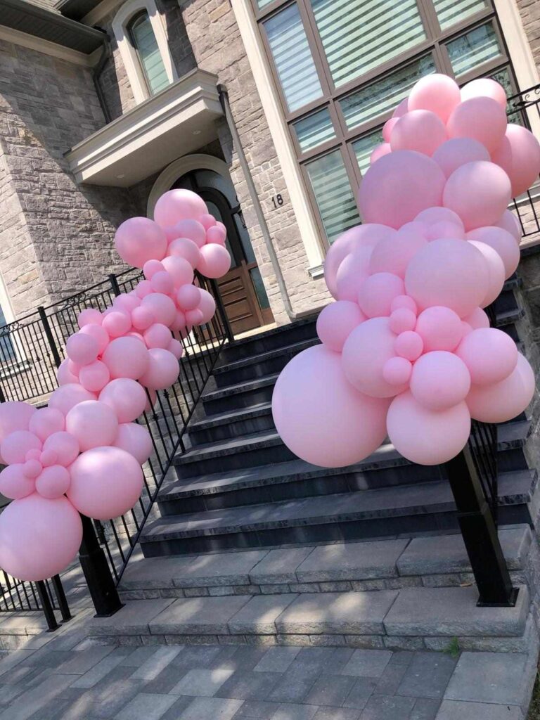 Pink staircase balloon garland