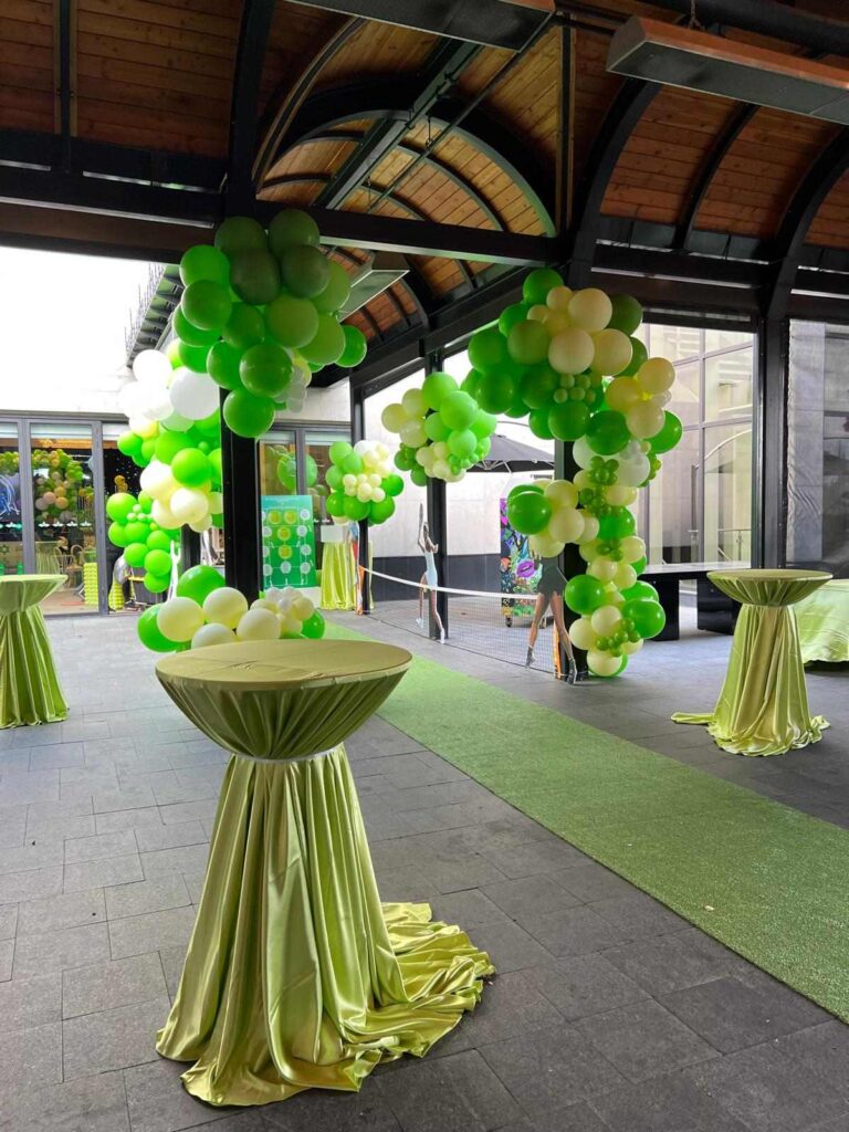 Green entrance balloon arches
