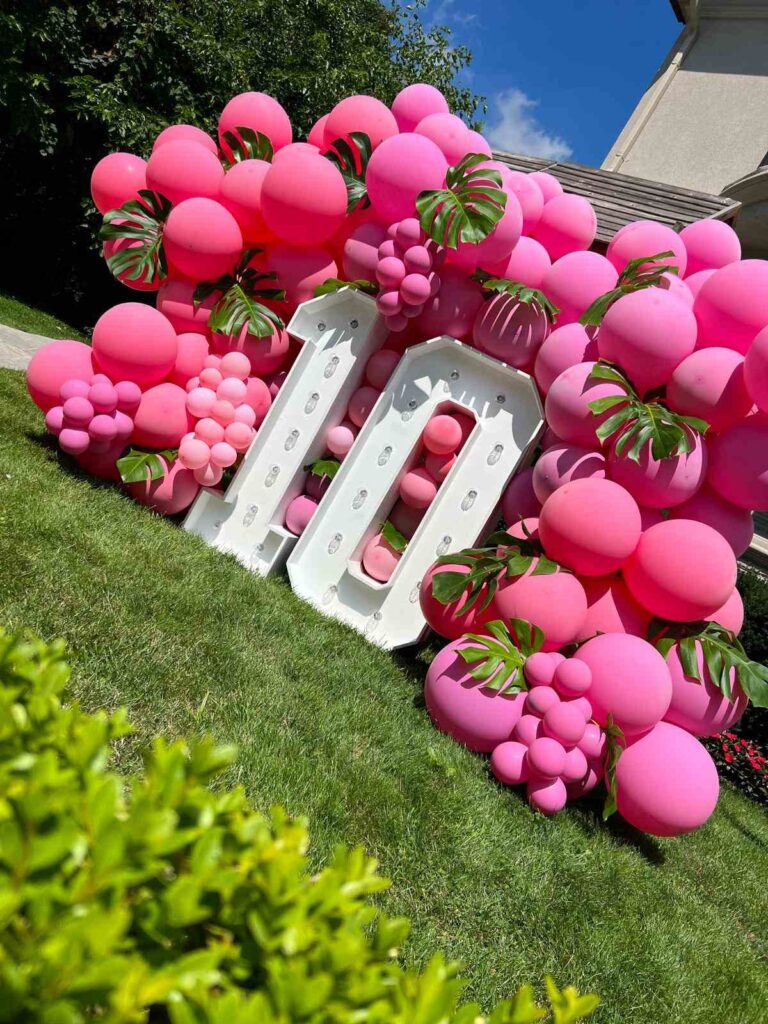 Pink 10th birthday balloon backdrop