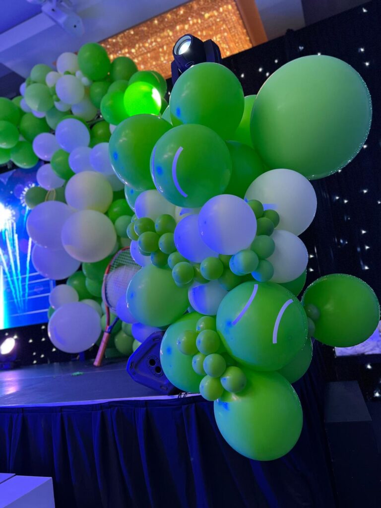 Tennis-themed balloon garland