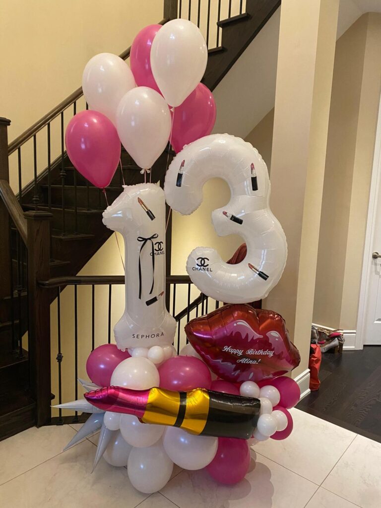 Makeup-themed 13th birthday balloon decor