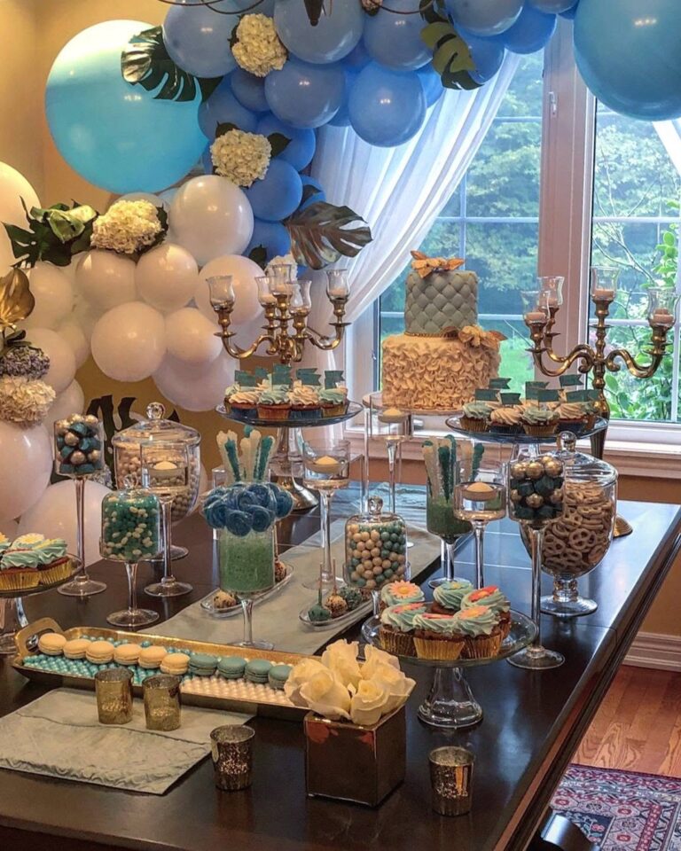 blue balloon garland with hydrangea flowers dessert table
