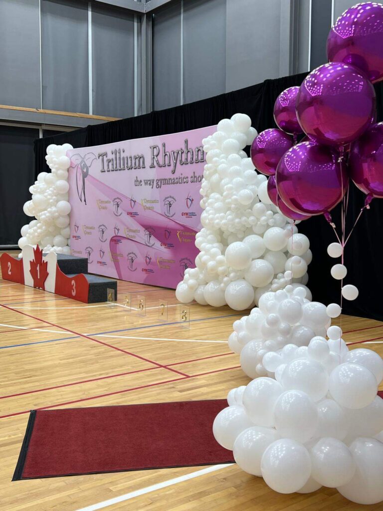 White gymnastics balloon garland