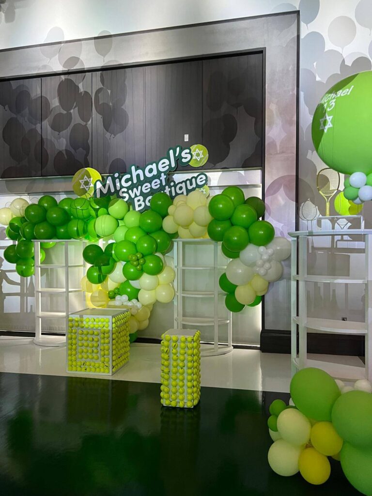 Tennis-themed balloon garland