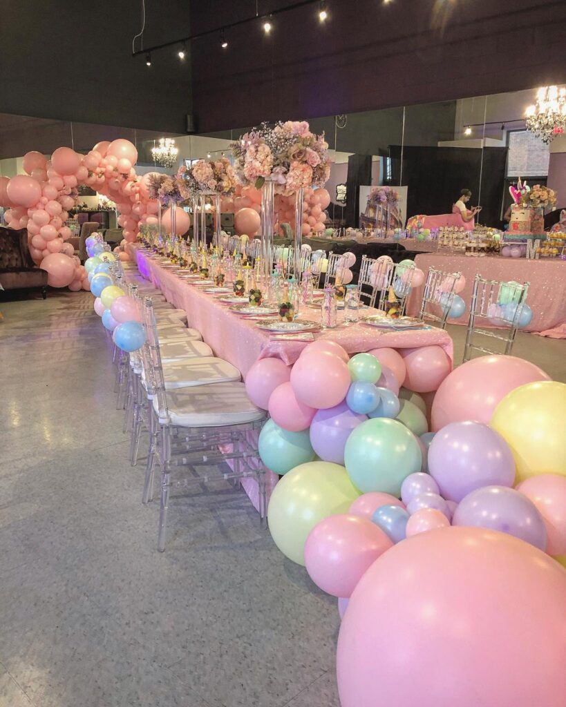 pastel balloon and flower birthday party decor