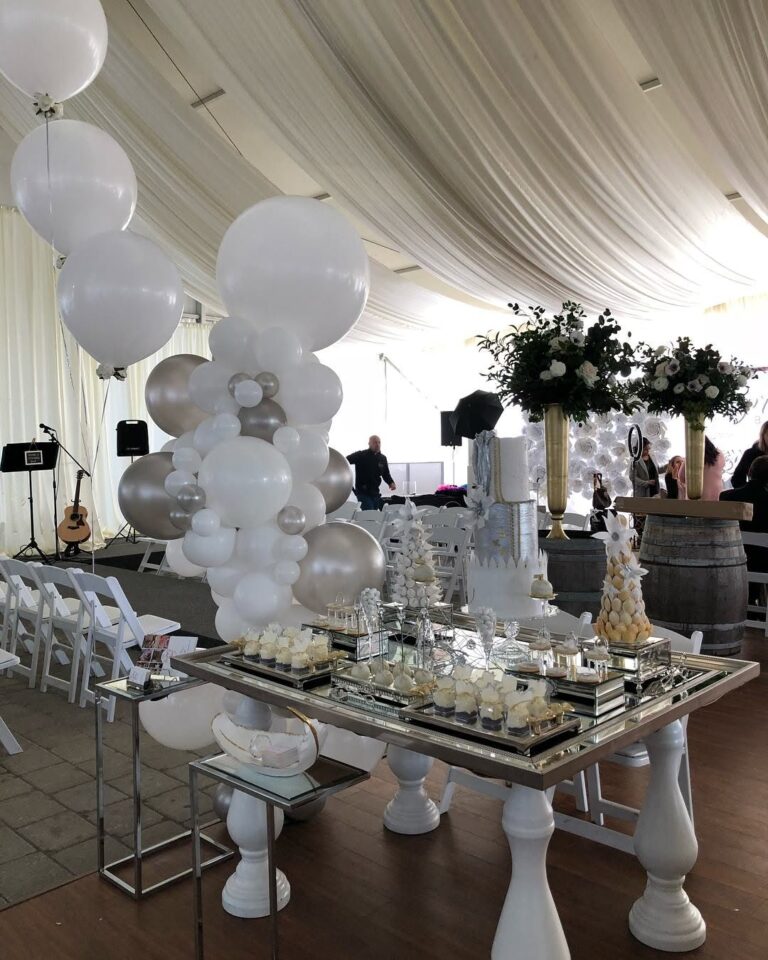 white balloon and flower dessert table decor