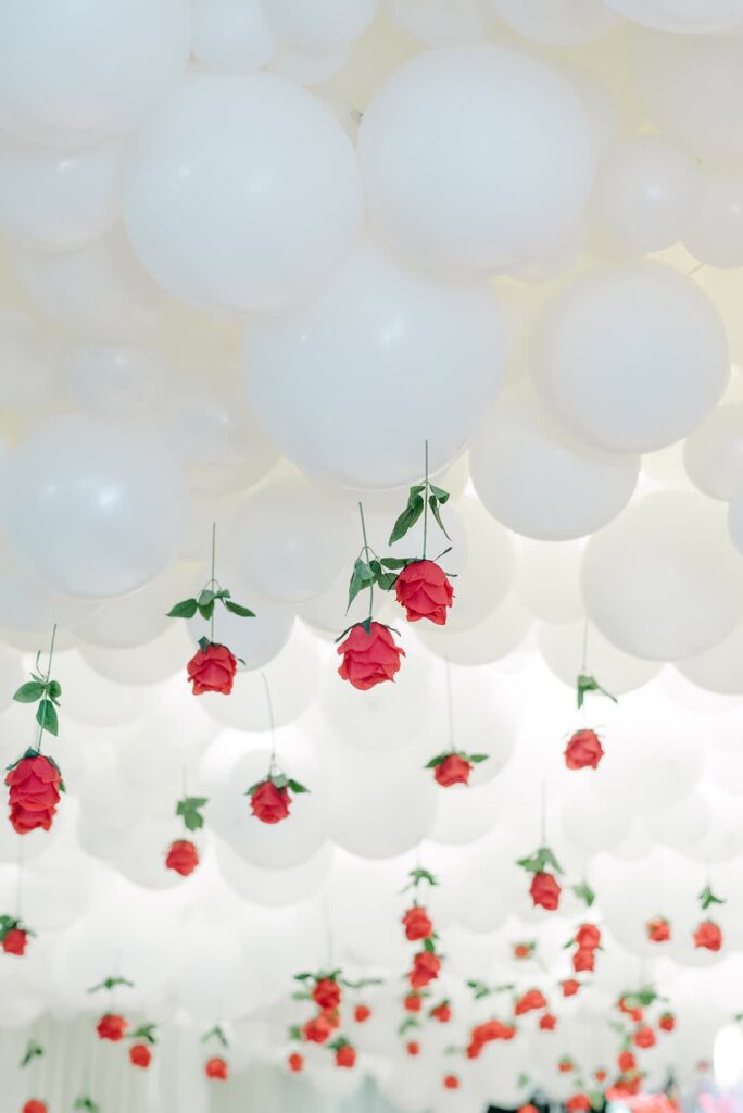 white-balloon-ceiling-red-rose-closeup-decor