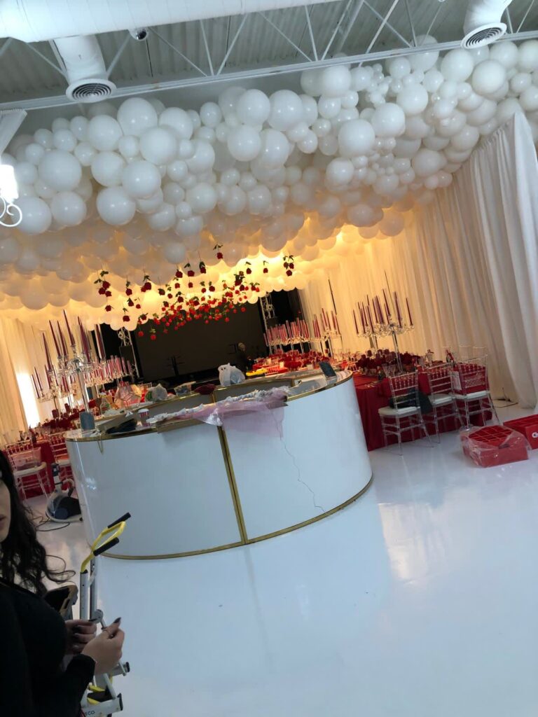 white-balloon-cloud-ceiling-red-rose-event-decor