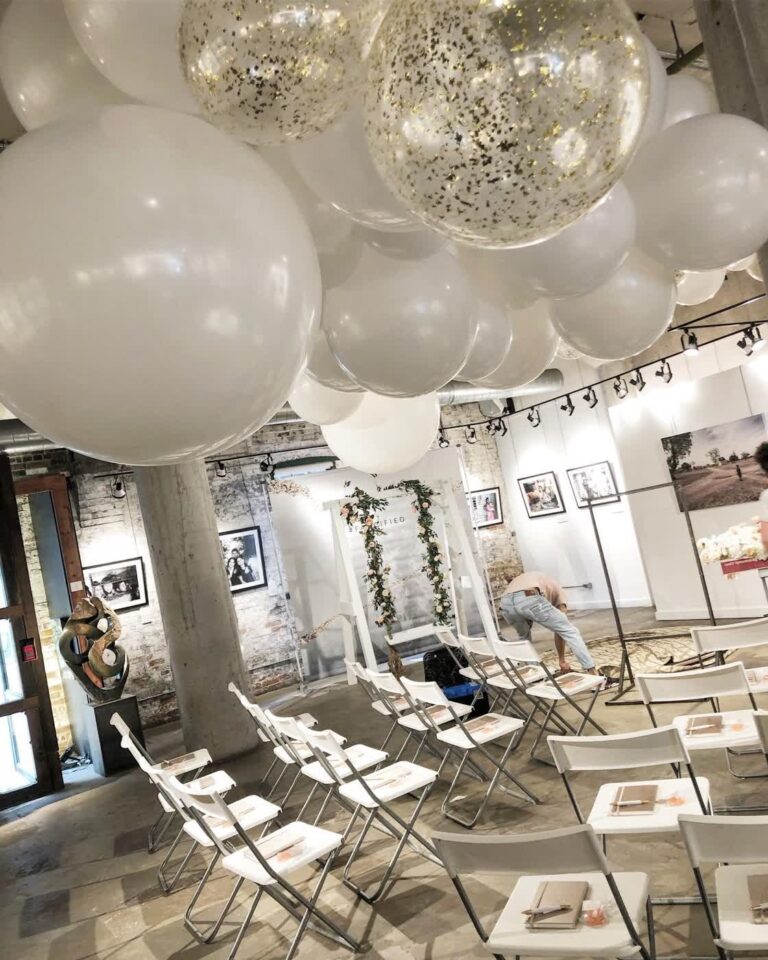 white-confetti-balloon-ceiling-ceremony-decor