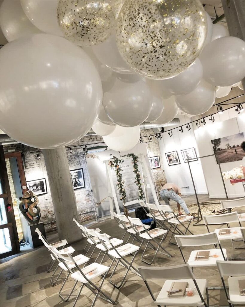 white-confetti-balloon-ceiling-ceremony-decor